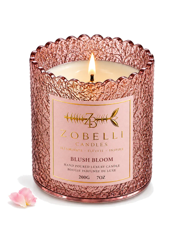 Blush Bloom luxury Zobelli candle on a pure white studio background with its printed gold paper label attached to the vessel